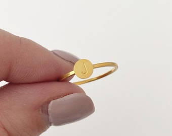 Gold initial letter ring, stacking rings