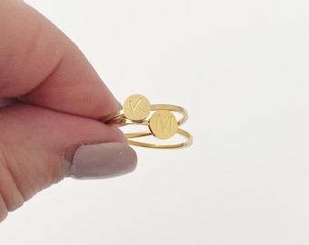 Gold initial letter ring, stacking rings