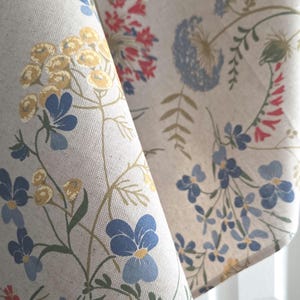 Wildflower cotton-blend tablecloth, beige-tan linen-look with blue, red and white floral print, artisan-made in Italy.