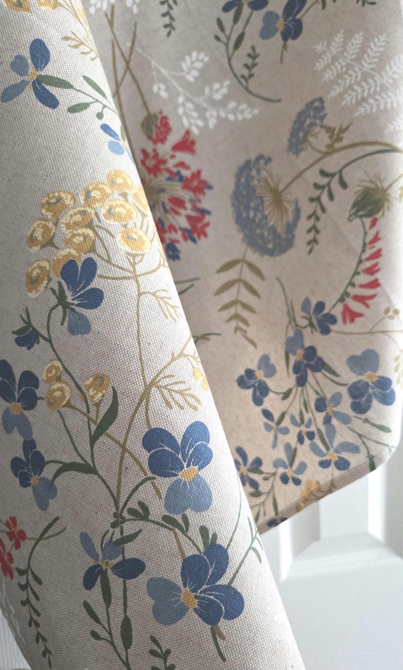 Wildflower cotton-blend tablecloth, beige-tan linen-look with blue, red and white floral print, artisan-made in Italy.