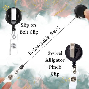 a picture of a clip on belt clip attached to a retractable swive