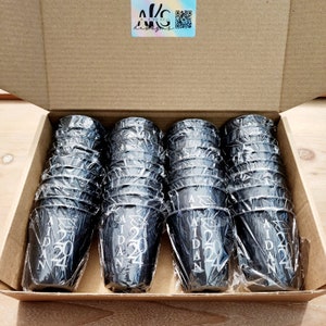 May include: A cardboard box filled with black plastic cups. Each cup has the text "Aidan 2024" printed on it.