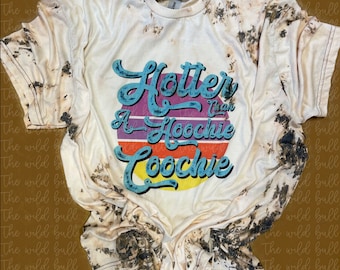Más caliente que una camiseta hoochie coochie