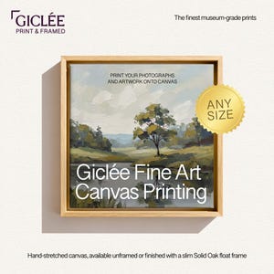 May include: A framed canvas print featuring a landscape painting, set within a light oak float frame. The artwork displays the text "Giclée Fine Art Canvas Printing" and "Print Your Photographs and Artwork onto Canvas."