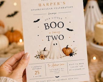 May include: A rectangular invitation card with a cream background featuring a central ghost illustration, pumpkins, and bats. The text reads: Join us for Harper's spooktacular celebration because our little BOO is turning TWO, with event details.
