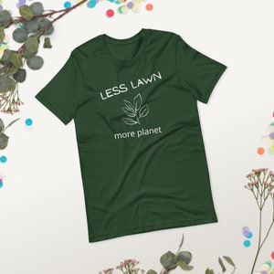 May include: A dark green t-shirt with the text "LESS LAWN more planet" and a simple white line drawing of a plant.