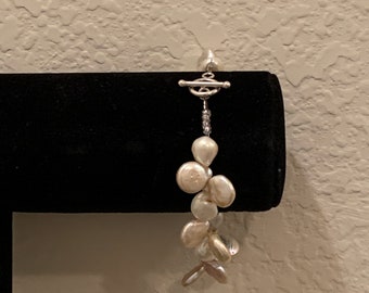 Vintage Pearl Bracelet. Natural Loving String, w/ 22 natural pearls, 925 silver latch, 21cm (8 1/2"), 26.6g, not knotted. Preowned 1970s.