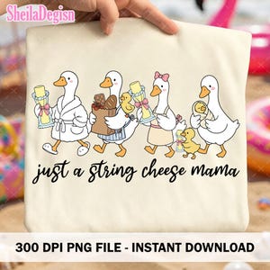 May include: Cream-colored tote bag featuring a whimsical illustration of geese. The geese are depicted in various outfits, carrying string cheese and groceries, with the text "just a string cheese mama" below. The design includes a cute, cartoonish style.