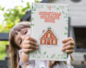 May include: A child holds up a white Christmas coloring book with a gingerbread house illustration and the text "Christmas Coloring Book".