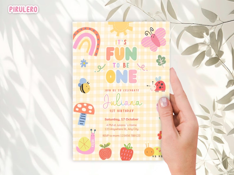 May include: A colorful birthday invitation with the text "IT'S FUN TO BE ONE" and the name "Juliana". The invitation features illustrations of a rainbow, butterfly, bee, ladybug, mushroom, snail, apple, and caterpillar on a yellow gingham background.