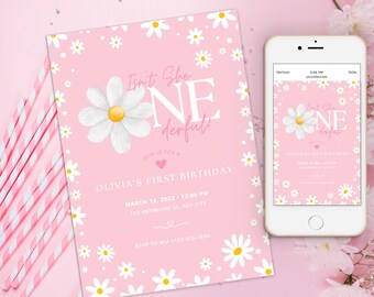 May include: Pink first birthday party invitation with a white daisy pattern. The invitation says "Isn't She One Derful!" and includes the date, time, and location of the party. RSVP information is also included.