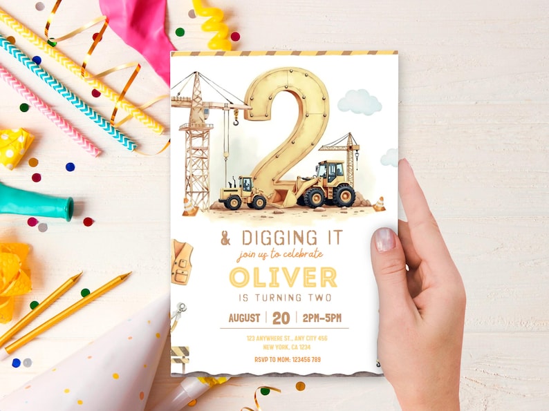 May include: A birthday invitation featuring a watercolor illustration of construction vehicles and a large number 2. The text reads "& Digging It" and "Oliver is turning two". The invitation is held by a hand.