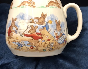 Vintage Bunnykins Royal Doulton Mug. Excellent condition. Playing at the beach.