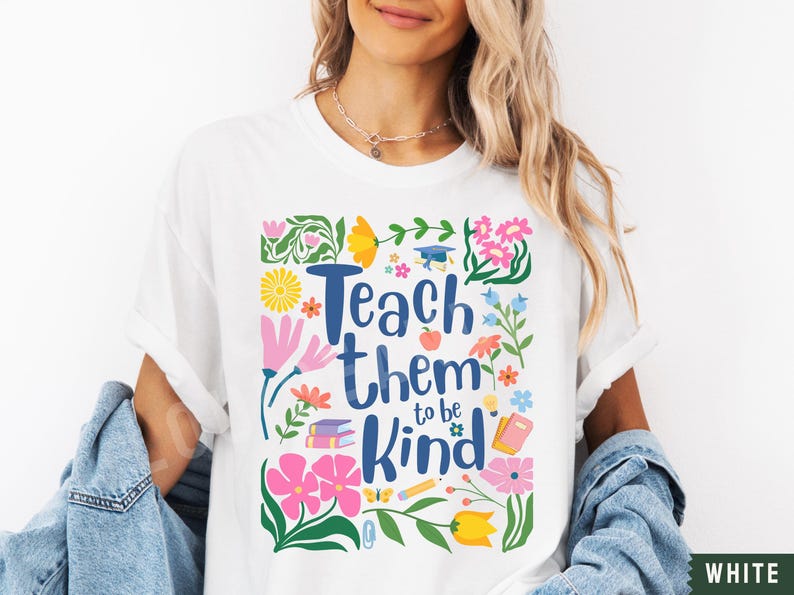 May include: White t-shirt with a colorful floral design and the text "Teach them to be kind".