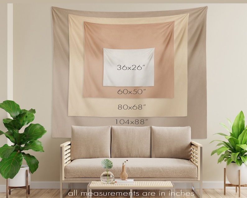 May include: A beige tapestry with four different size options listed in inches. The tapestry is hanging on a wall behind a beige couch.