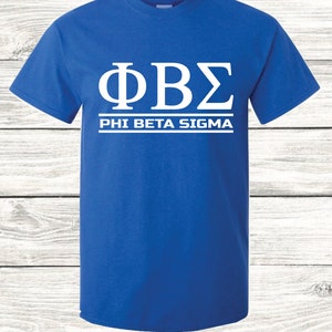 May include: A royal blue t-shirt with white lettering that reads "ΦΒΣ PHI BETA SIGMA".