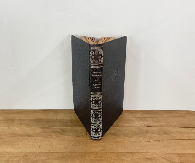 May include: A set of three ceramic vases in varying heights. The vases are white with a textured, ridged design. The tallest vase is approximately 10 inches tall, the medium vase is 8 inches, and the smallest is 6 inches.