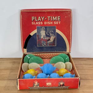 May include: A set of three ceramic mugs with a speckled, matte finish. The mugs are in shades of cream, light gray, and dark gray. Each mug has a simple, minimalist design, perfect for coffee or tea.