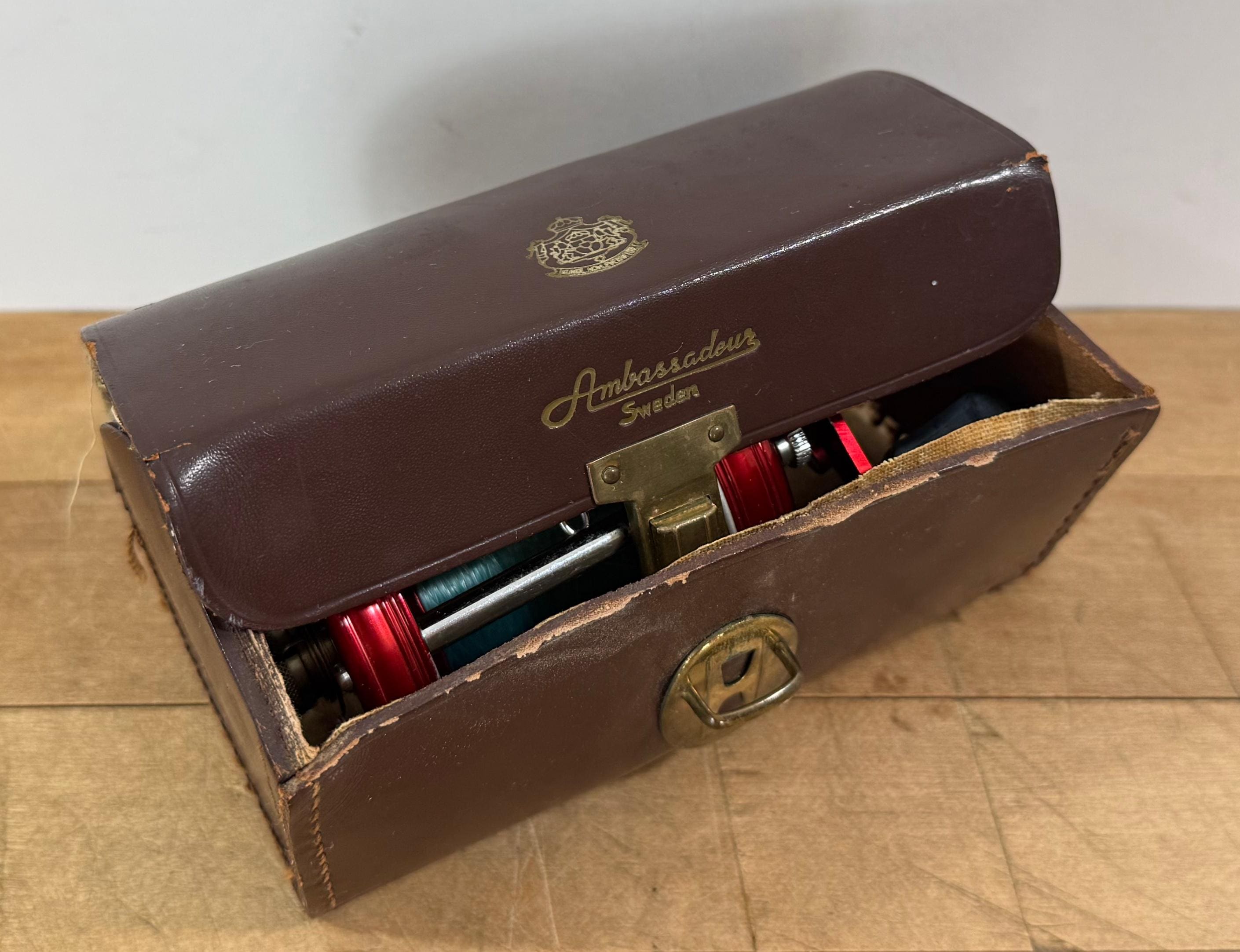 Red Abu Garcia Ambassadeur 6000 Fishing Reel, 1968 Reel in Leather