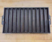 Vintage No 2 Cast Iron 11 Slot Corn Stick Pan. Good used condition.