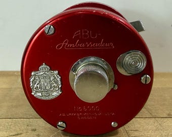 Red Abu Garcia Ambassadeur 6000 Fishing Reel, 1968 Reel in Leather