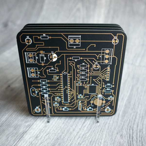 PCB coasters, set of 4 with display stand, black, blue, white or purple printed circuit board. 10 x 10cm x 1.6mm. Gold plated traces.