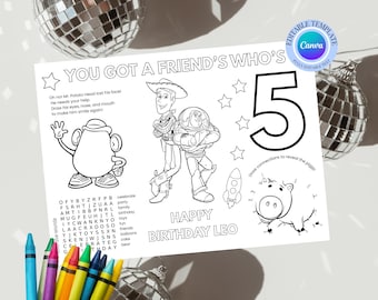 May include: A black and white coloring page with the text "YOU GOT A FRIEND'S WHO'S" and "HAPPY BIRTHDAY LEO". The page features illustrations of characters, a number 5, and a word search puzzle. Crayons are in the foreground.
