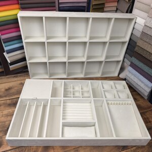A set of inserts for jewelry, rings, necklaces, and belts. Modules, organizers.