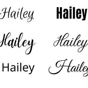 May include: Five different variations of the name "Hailey" written in different fonts and styles. The name is written in cursive, bold, and a combination of both.