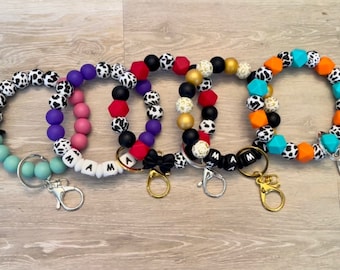 Muñeca de llavero de cuentas de silicona con estampado de vaca personalizable (¡Elija su estilo y colores de acento!)