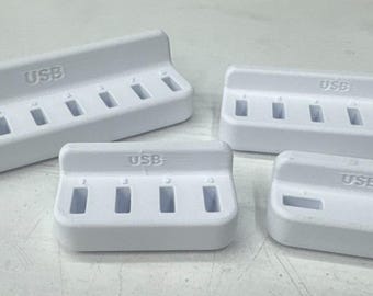 Soportes para memorias USB - adhesivos (varios tamaños: 2, 4, 6 u 8 soportes USB)