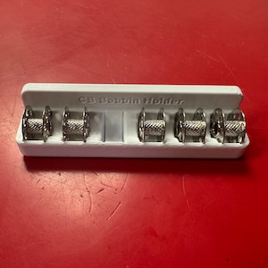 Bernina CB Bobbin Stick on Holder (holds 6 Bobbins)