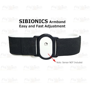 Puede incluir: Brazalete negro con forro blanco y un componente central blanco. Se muestra el texto "SIBIONICS Armband Easy and Fast Adjustment". También es visible la nota "Sensor NOT Included".