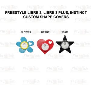 May include: Three custom shape covers for Freestyle Libre 3, Libre 3 Plus, and Instinct devices. The set includes a blue flower-shaped cover, a red heart-shaped cover, and a black star-shaped cover, each featuring a central circular cutout.