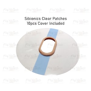 Op de afbeelding: Een transparante pleister met een lichtbruine, ovaalvormige afdekking, gecentreerd op een witte, cirkelvormige achterkant met een lichtblauwe streep. De tekst luidt "Sibionics Clear Patches 10pcs Cover Included."