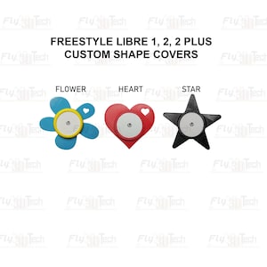 May include: Three custom shape covers for Freestyle Libre 1, 2, and 2 Plus sensors. The blue flower, red heart, and black star shapes each feature a central circular cutout. The text reads: FREESTYLE LIBRE 1, 2, 2 PLUS CUSTOM SHAPE COVERS.