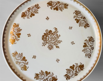 Soporte para pasteles de porcelana vintage de Francia con pedestal y detalles decorativos dorados.