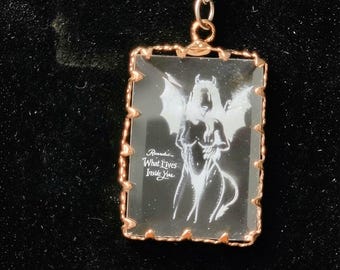 White Laser Engraved Crystal "Remember What Lives Inside Of You" Demoness Pendant