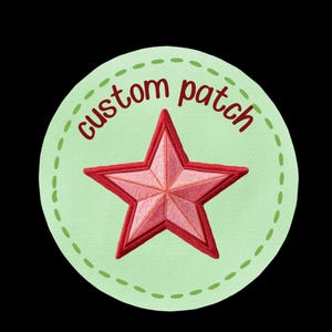 May include: Embroidered custom patch featuring a red star on a light green circular background. The words "custom patch" are stitched in a reddish-brown color around the star. The patch has a dashed green border and is set against a black background.