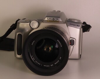 Minolta Dynax 404si 35mm film camera - 28 - 80 lens
