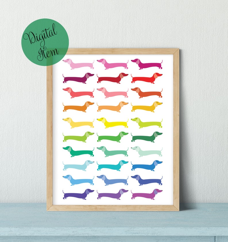 May include: A printable digital art print featuring a rainbow of dachshund dogs. The dogs are arranged in rows, with each row a different color of the rainbow. The background is white.