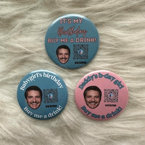 May include: Three round blue and pink buttons with a person's face and a QR code on each. The text on the buttons reads "It's my Birthday Buy me a drink!" "Babygirl's birthday Buy me a drink!" and "Daddy's b-day girl Buy me a drink!"
