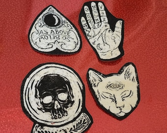Spooky occult iron on patches.