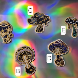 May include: Five embroidered iron-on patches featuring different psychedelic mushroom designs. The patches are in various colors, including purple, blue, gold, and white. The patches are perfect for adding a touch of whimsy to clothing, bags, or other accessories.