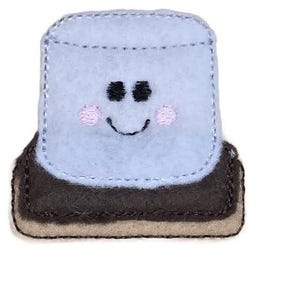 May include: A felt s'more with a smiling marshmallow, chocolate, and graham cracker.