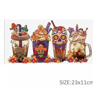 May include: A vibrant print featuring four stylized beverages decorated with Day of the Dead skulls and floral accents. The drinks are in various containers, including a mason jar and plastic cups, with colorful straws and toppings. The size is 23x11cm.