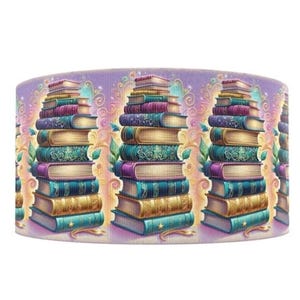 May include: A cylindrical design featuring stacks of colorful books in shades of teal, gold, purple, and blue. The books are adorned with decorative details and are set against a lavender background with floral accents.