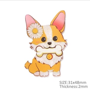 May include: A cartoon corgi dog illustration with a daisy on its head, holding a bone. The dog is orange, white, and tan with a gold collar. The image is 1.2 x 1.9 inches and 0.08 inches thick. The image has a glittery outline and is on a white background.