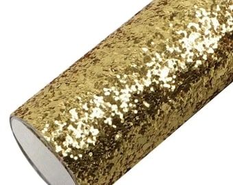 May include: A roll of gold glitter fabric with a textured surface.