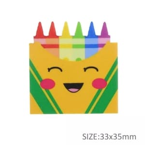 May include: A yellow box with a smiling face and green stripes. The box is filled with a set of six crayons in rainbow colors. The box is 33mm by 35mm.